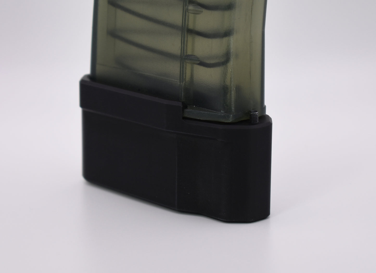 Side View installed on magazine: AMRU Designs AK-74 plus 6 magazine extensions for 5.56 and 5.45 magazines.